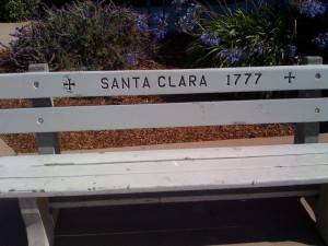 Photo of bench along Monterey coast near Fisherman's Wharf showing California Mission founding dates